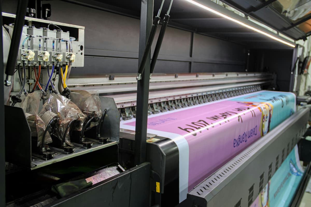 Direct mail being printed out on a printing press